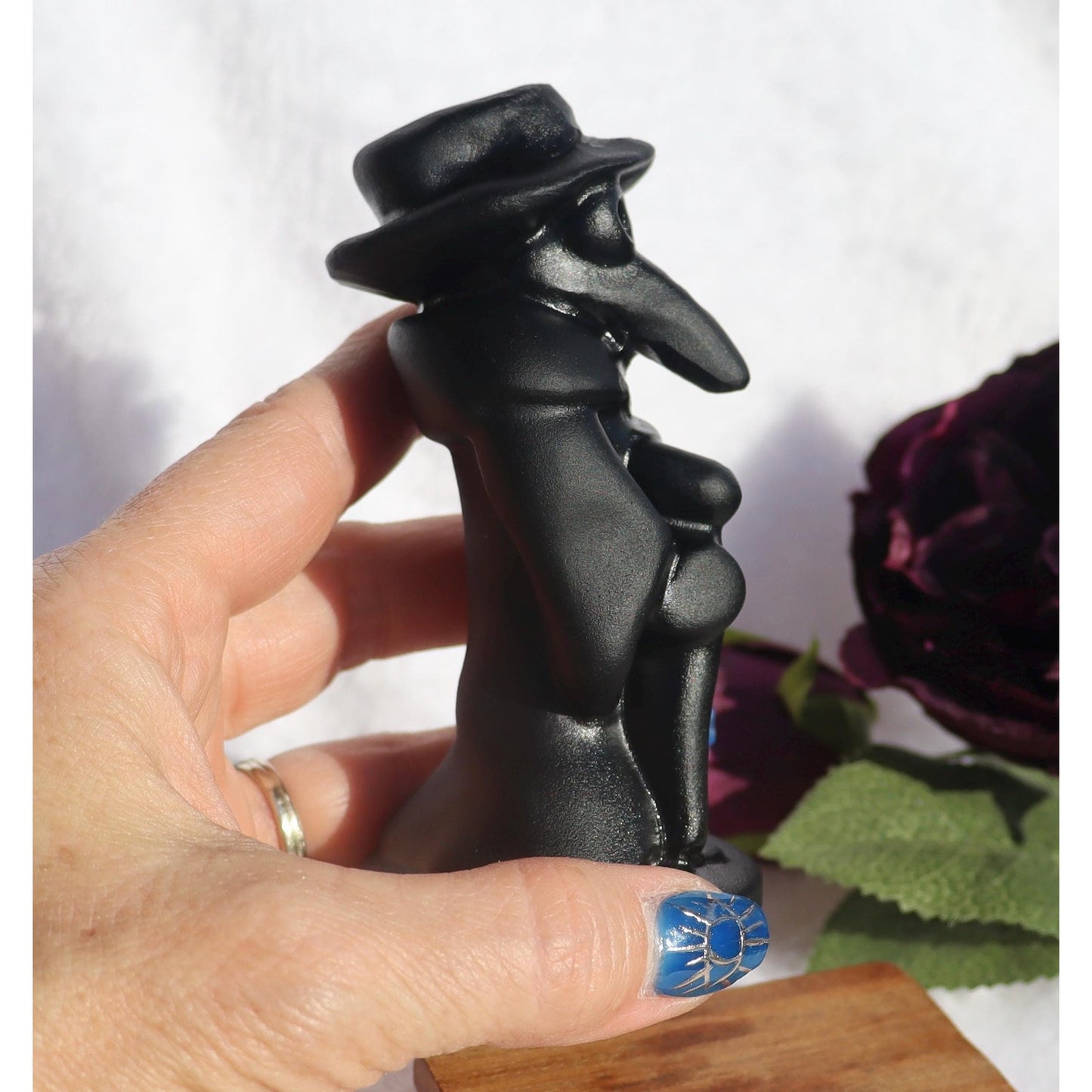 Obsidian Plague Doctor Carving