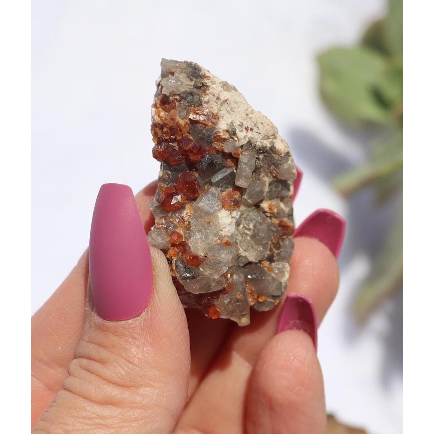 Spessartine Garnet and Smoky Quartz in White Albite Matrix