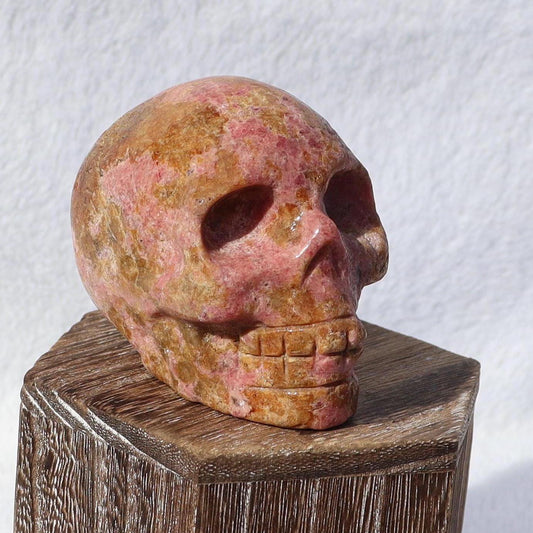 Rhodonite with Orange Spessartine Garnet Crystal Skull Carving
